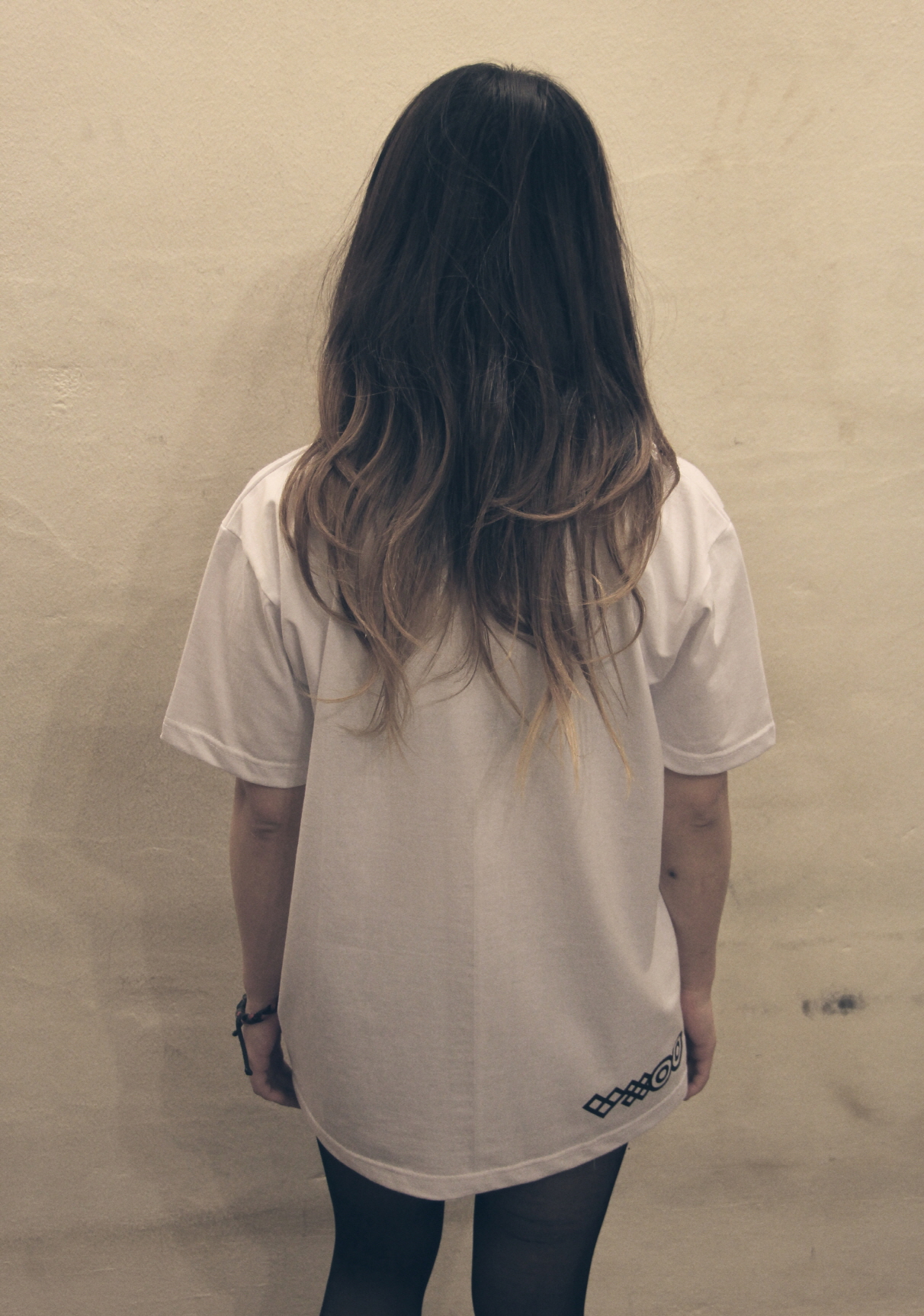 Angie-wearing-white-large-back